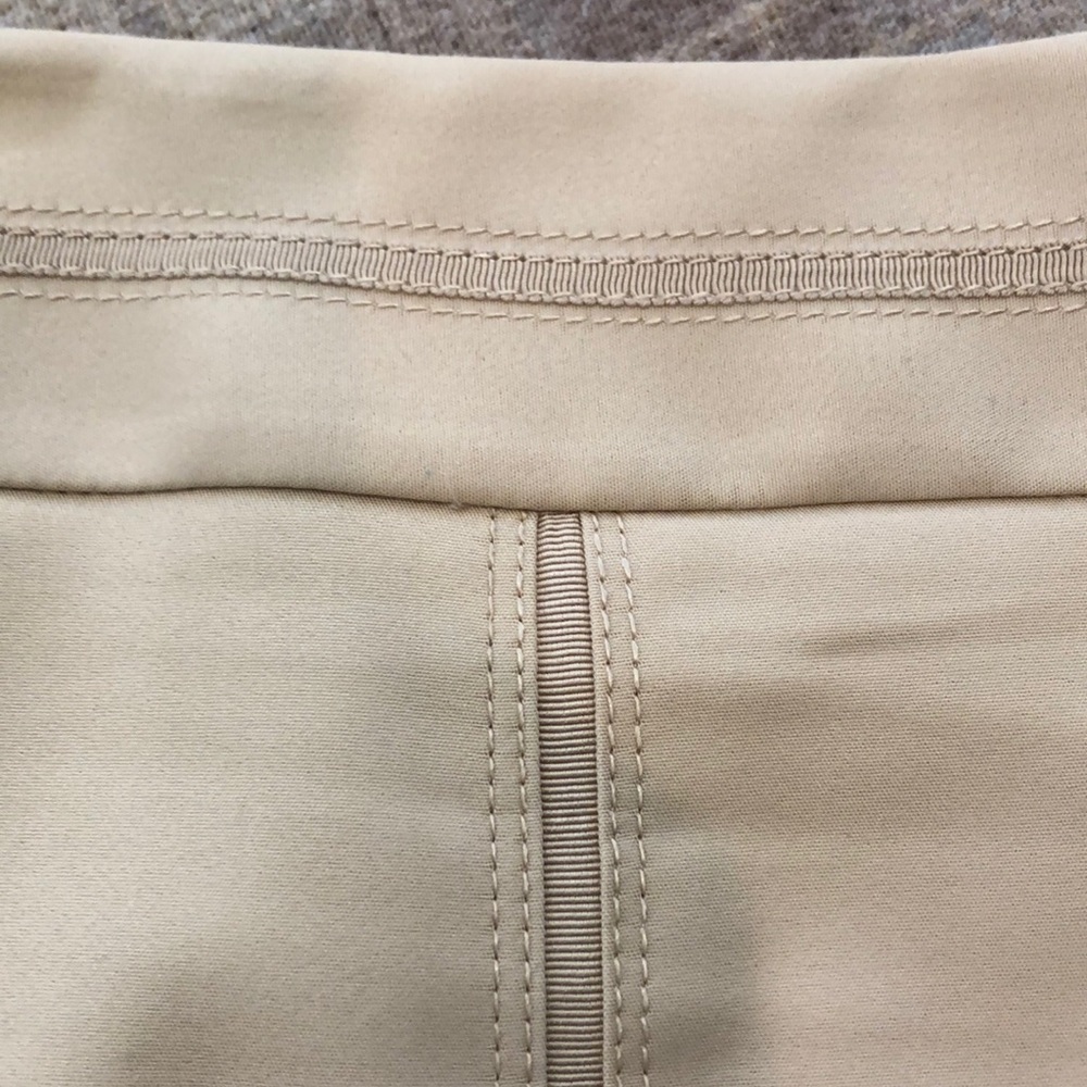 WHBM cream skirt with sophisticated detailing.